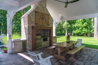 outdoor patio installation in Sykesville with eating space and outdoor kitchen