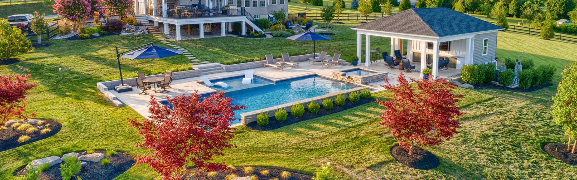 Backyard with Pool with Landscaping Services in Howard County, Glenelg, Ellicott City, Sykesville, West Friendship, and Clarksville
